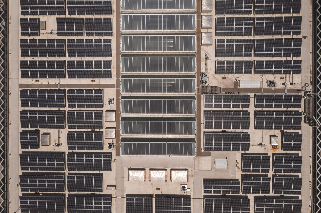 Solar panels across an industrial roof